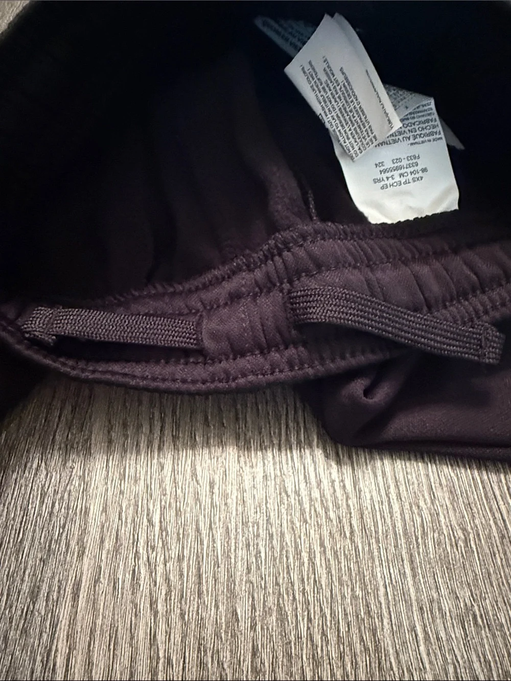 Nike Black Kids Sweatpants with White Swoosh Graphic